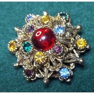 VTG Pin goldtone base w/ various color rhinestones and a red cabochon 1 1/2"